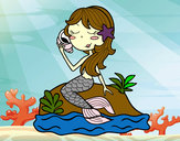 Desenho Sereia sentada numa rocha com uma caracol de mar pintado por amandadef