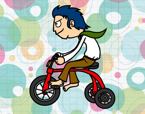 Rapaz no triciclo