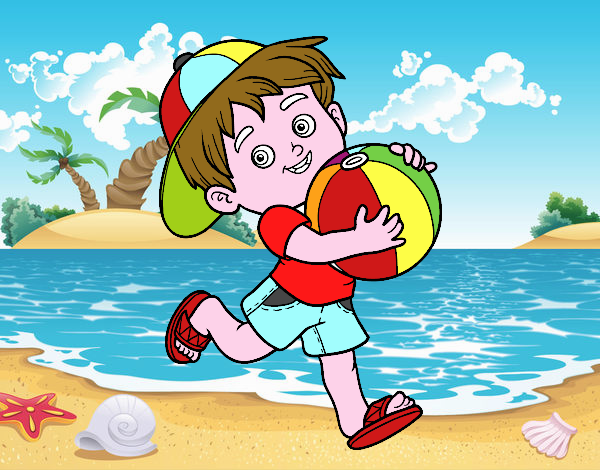 Criança que joga com esfera de praia