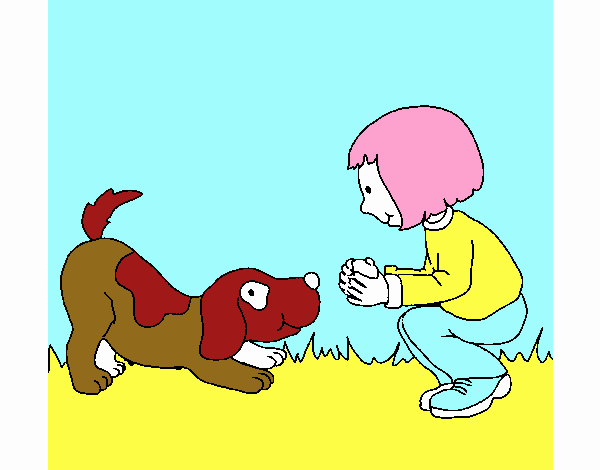 Menina e cão a brincar